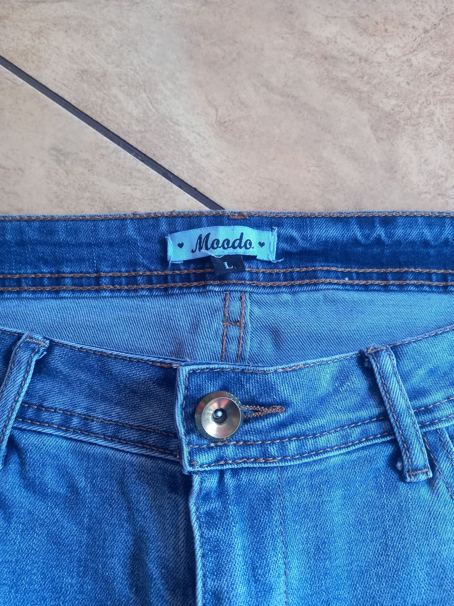 Spodnie jeansy damskie Moodo
