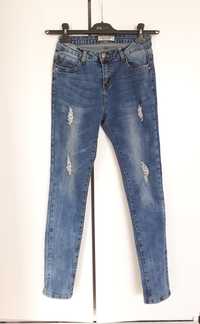 Dżinsy (jeansy) skinny z przetarciami