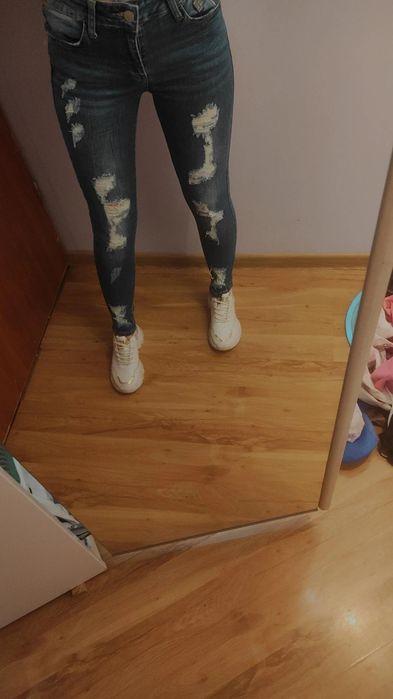 Spodnie jeans przetarcia