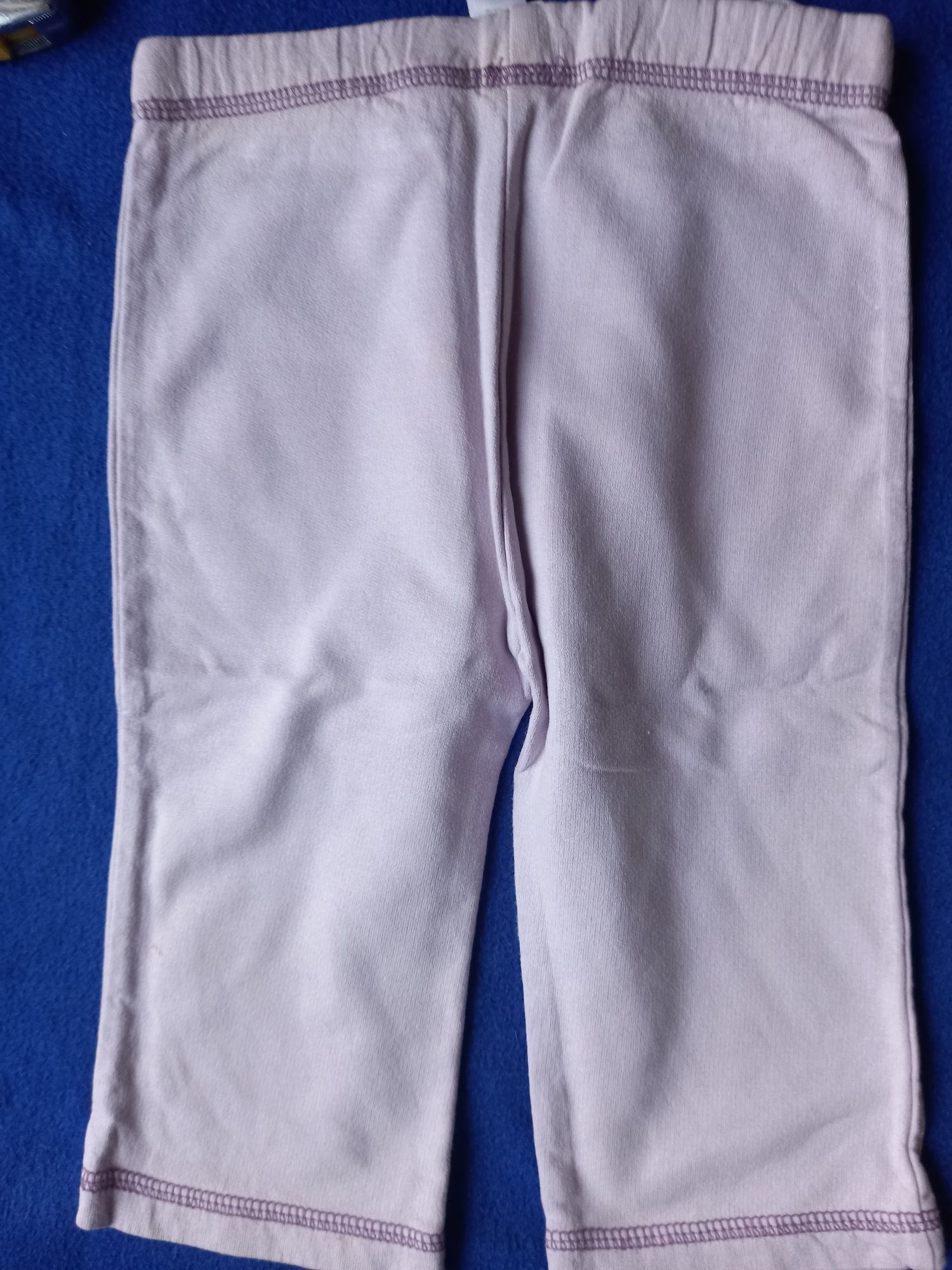 Spodnie bawełniane jasnofioletowy CoolClub- rozmiar 74