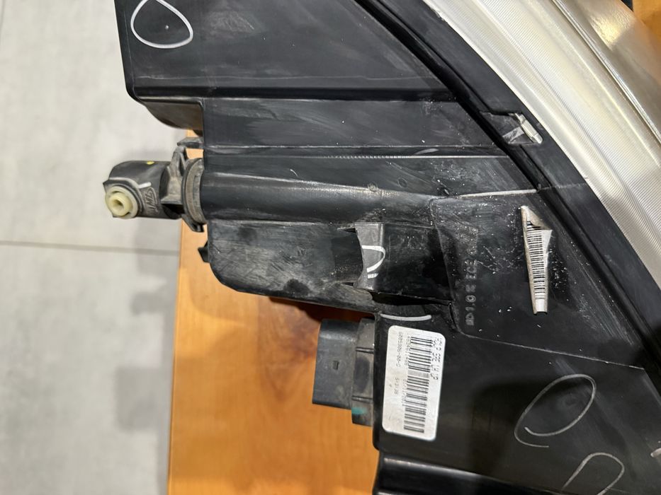 Фара ліва передня модел с 14 рік