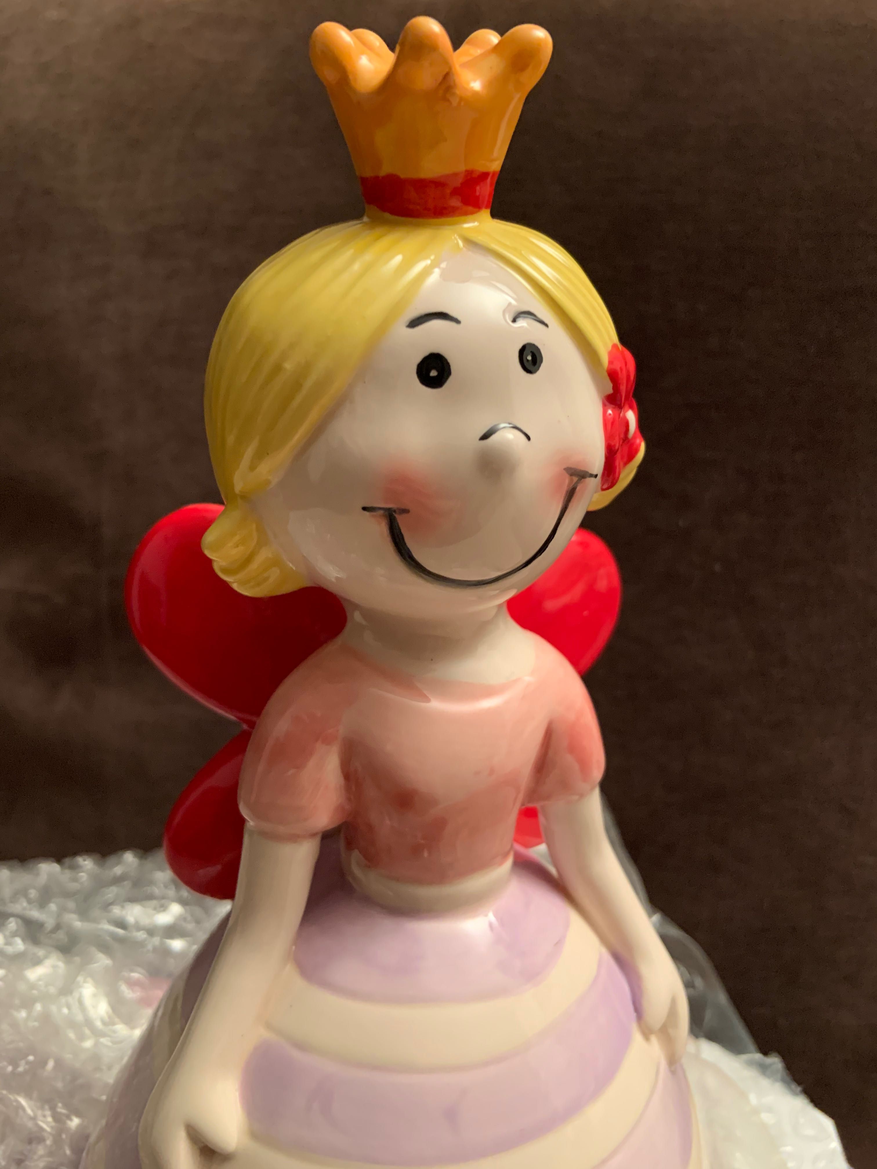Boneca (mealheiro) em loiça pintada
