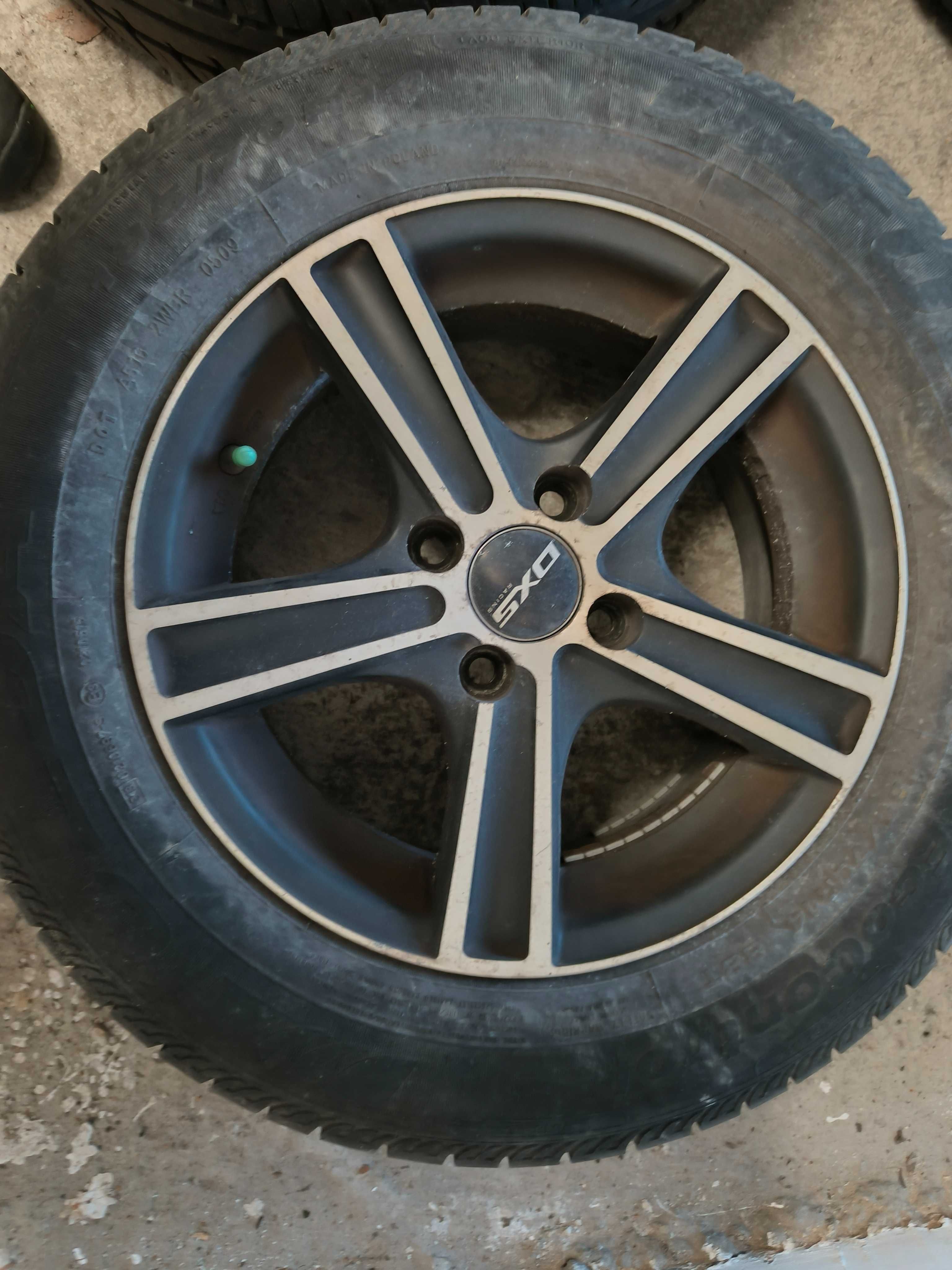 Felgi aluminiowe DXS 14 4x100 średnica 67,1 Honda plus opony
