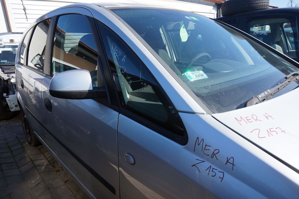 SZYBA KAROSERYJNA PRZEDNIA PRAWA BOCZNA MERIVA A 13115533 13115531 OPEL 2003-2005