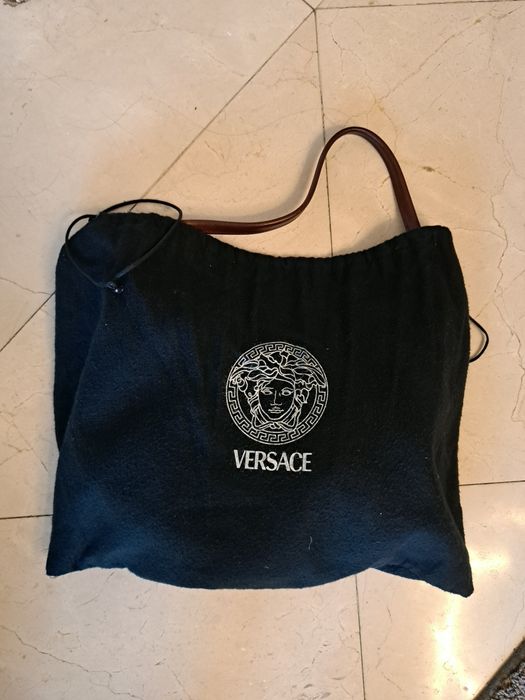 Mala da versace em perfeitas condições com saco para proteger