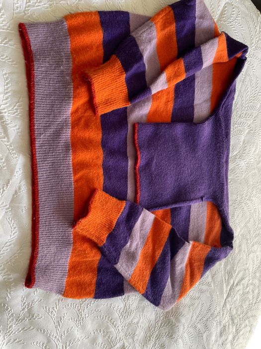 Camisolas e porta moedas