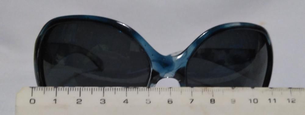 Oculos de sol senhora
