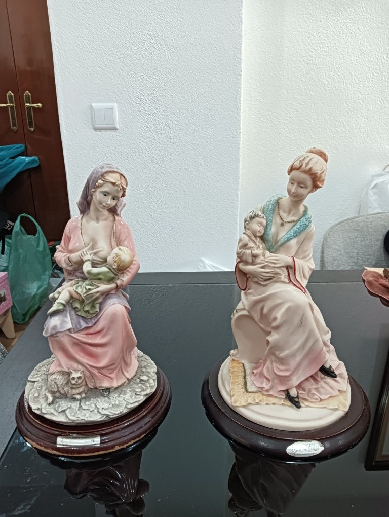 Vendo duas figuras decorativas