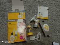 Новый двухфазный электрический молокоотсос medela