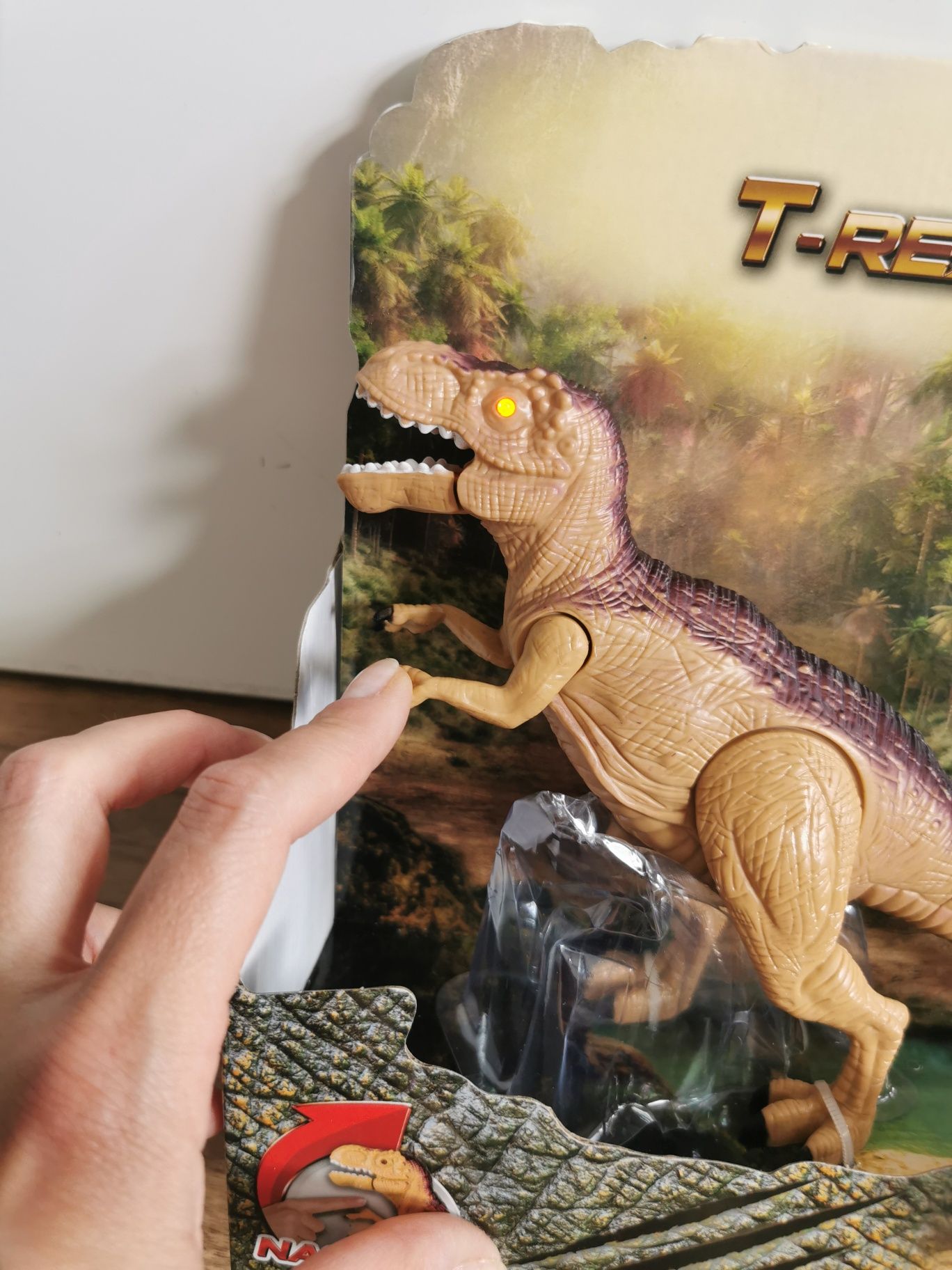 Dinozaur T-Rex zabawka dźwięki światło rusza ręką ryczy