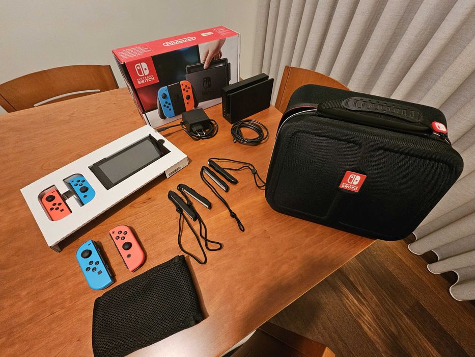 Nintendo Switch (mala, 4 Joy-con, 2 comandos para joicon