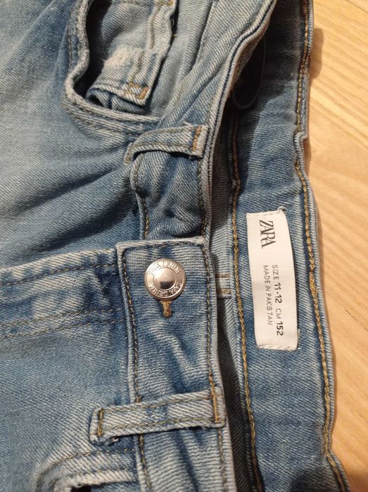 Spodnie z przetarciami dziurami ZARA 152 jeansy