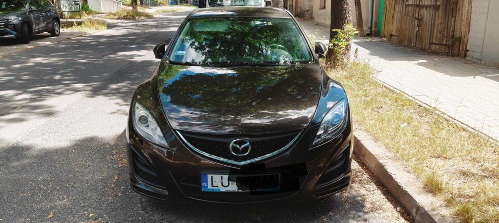Uszkodzony samochód osobowy Mazda 6