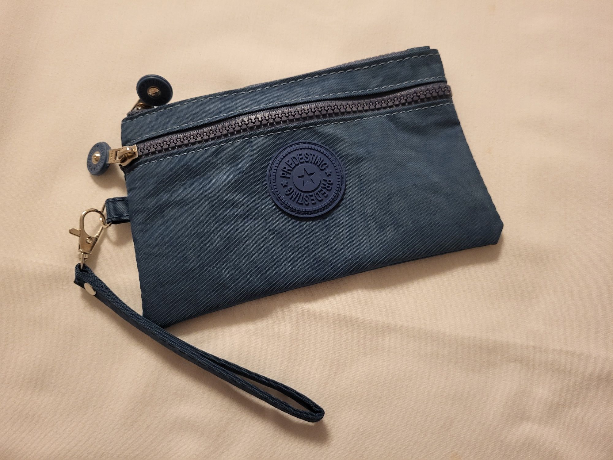Carteira Azul ou pequena necessaire