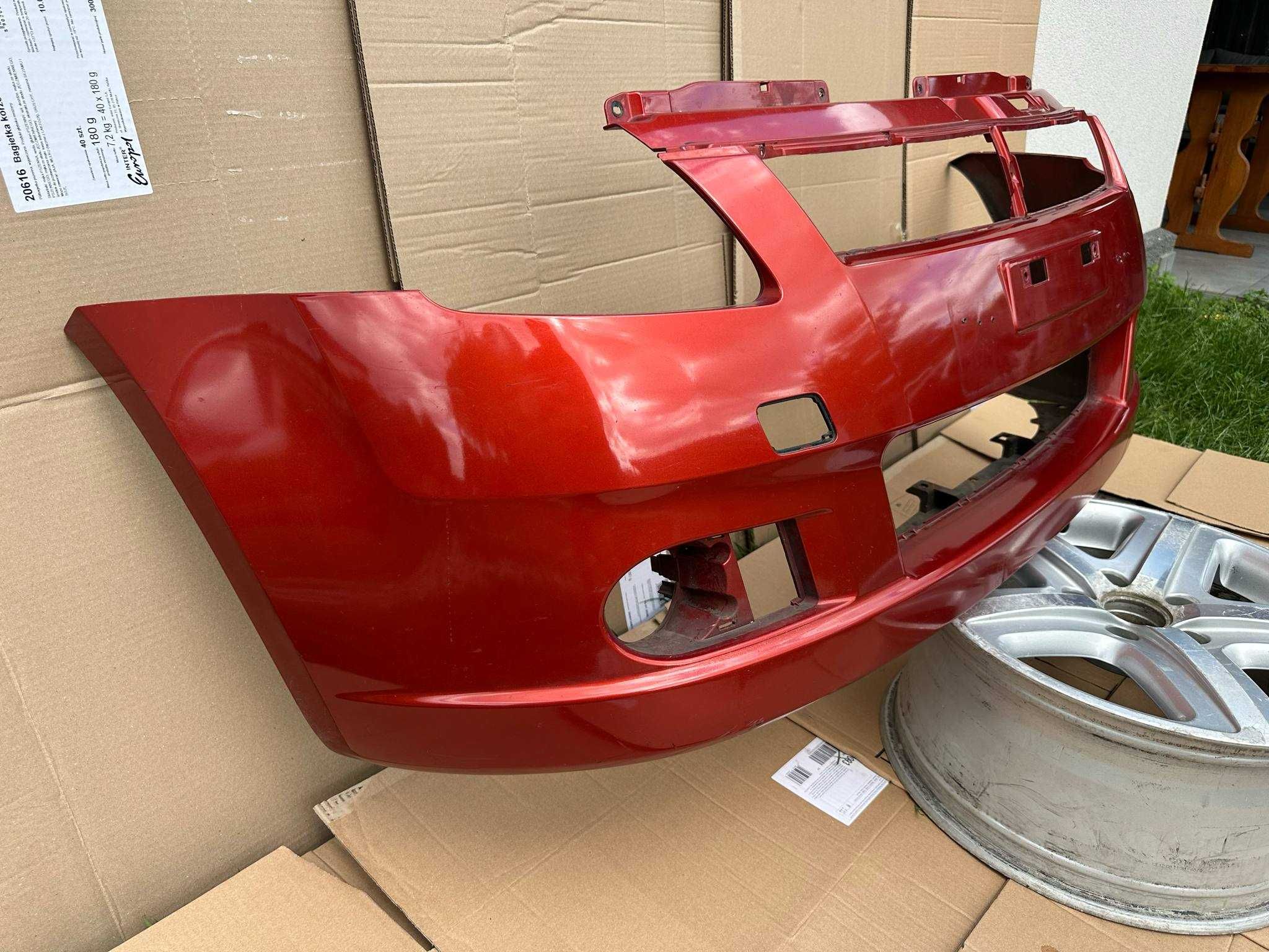 Suzuki Swift mk6 04-08 zderzak przedni/przód Orginał