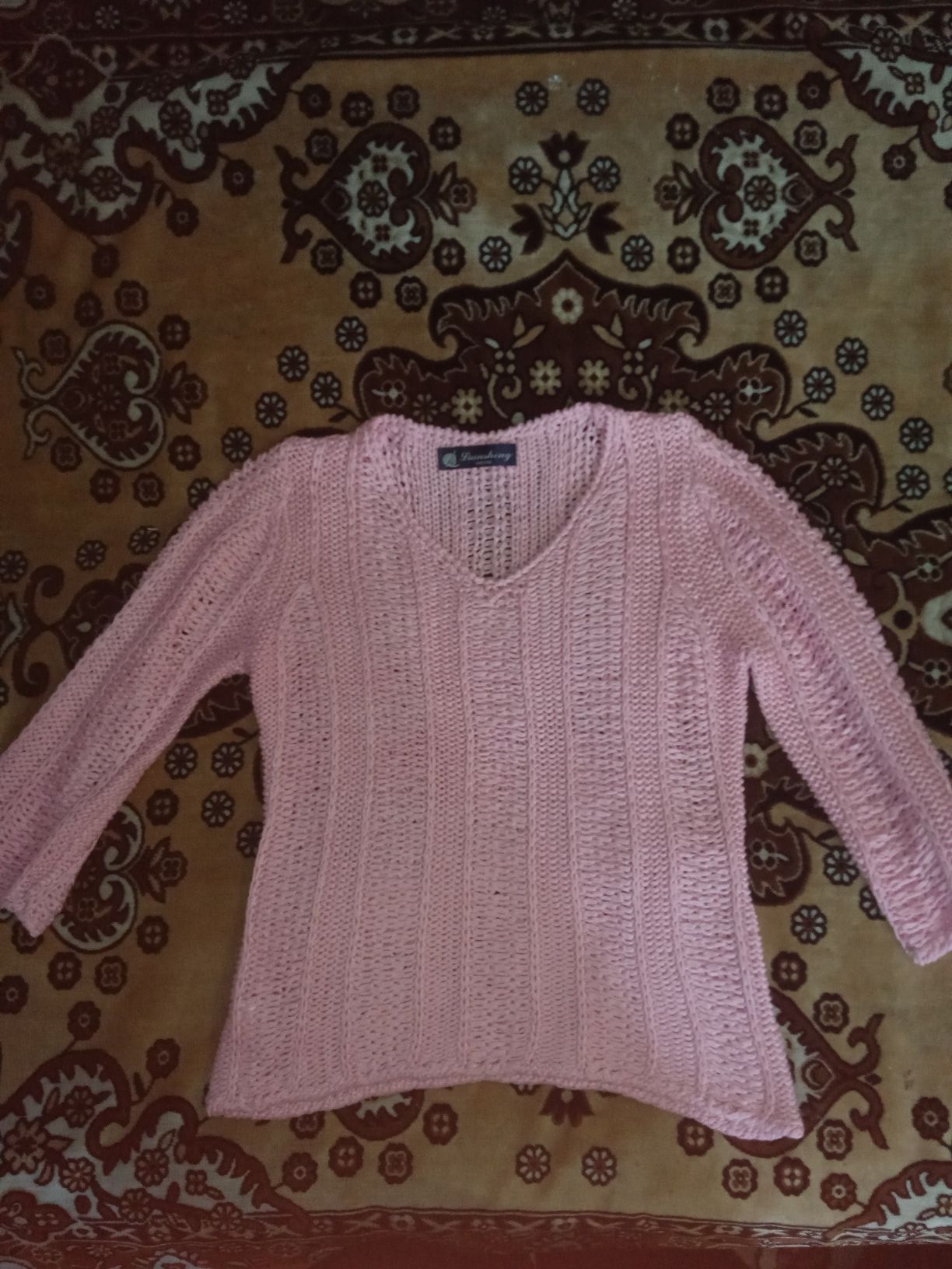 Рожева, в'язана светр