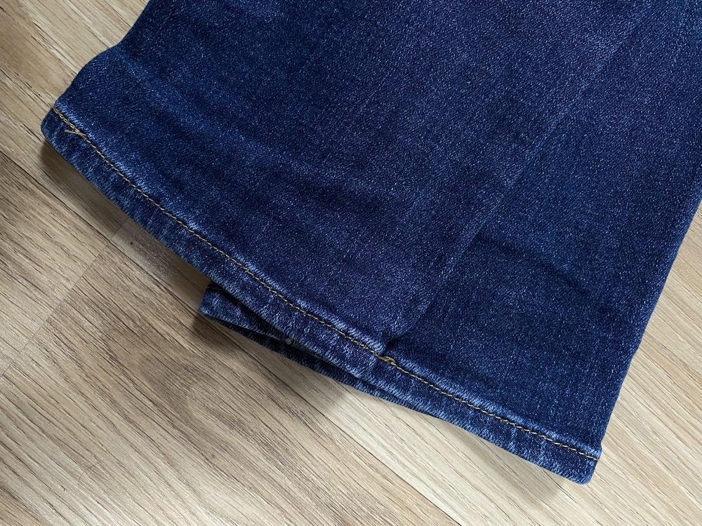 Jeansy 34 Levi Strauss wysoki stan lekko elastyczne proste nogawki