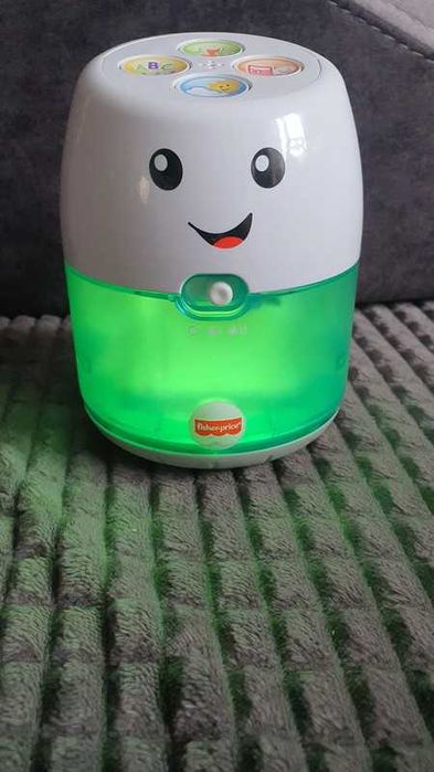 Zestaw Fisher price inteligentny głosniczek malucha + bębenek + gratis