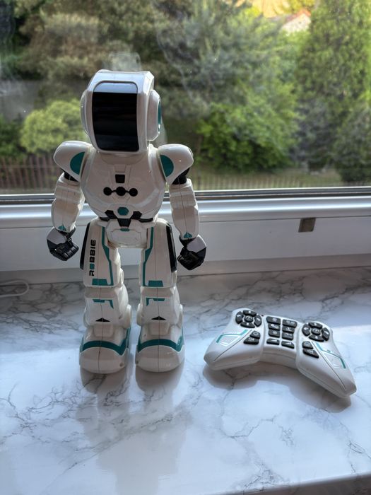 Robot na pilot pilota biały tańczy zabawka rusza się