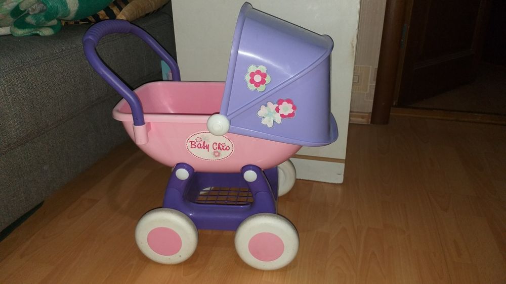 Детская игрушечная коляска