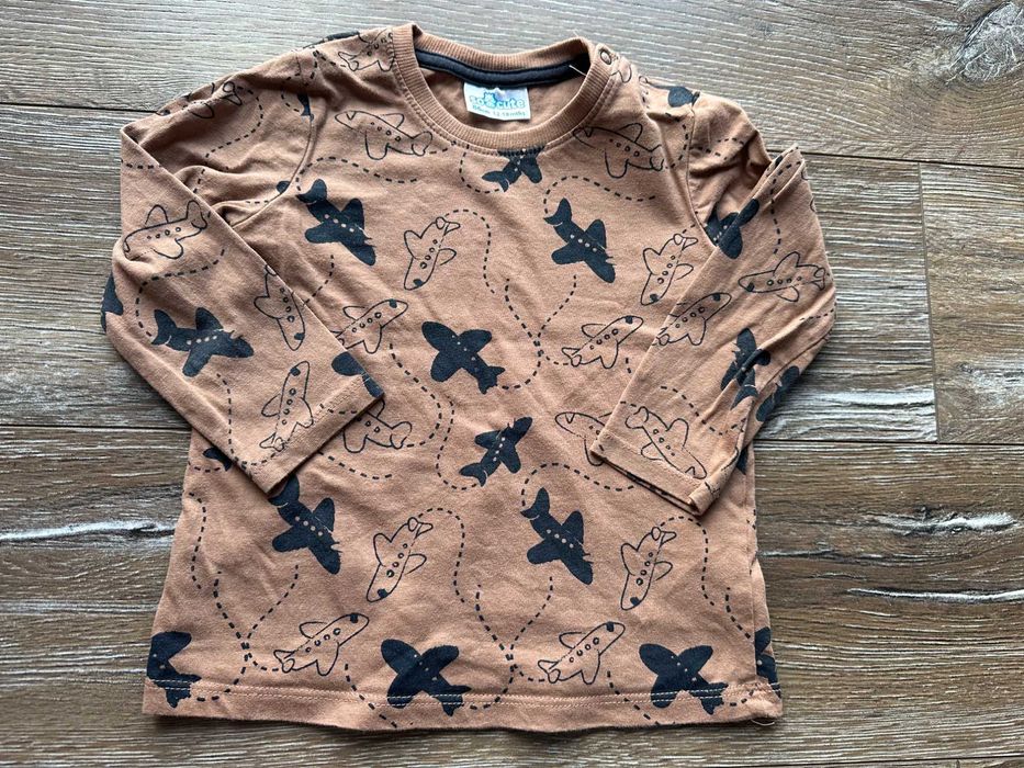 Bluzka t-shirt stan bardzo dobry jasnobrązowy z samolotami So Cute 86