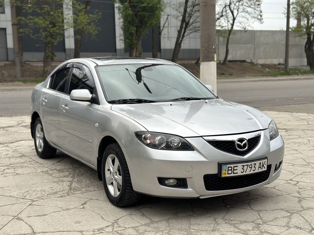 Mazda 3 автомат 1.6 газ/бенз