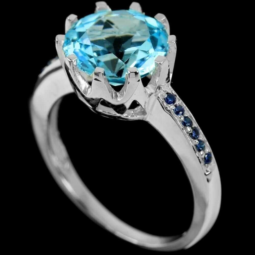 Серебряное кольцо с небесно- голубым топазом. Размер 17