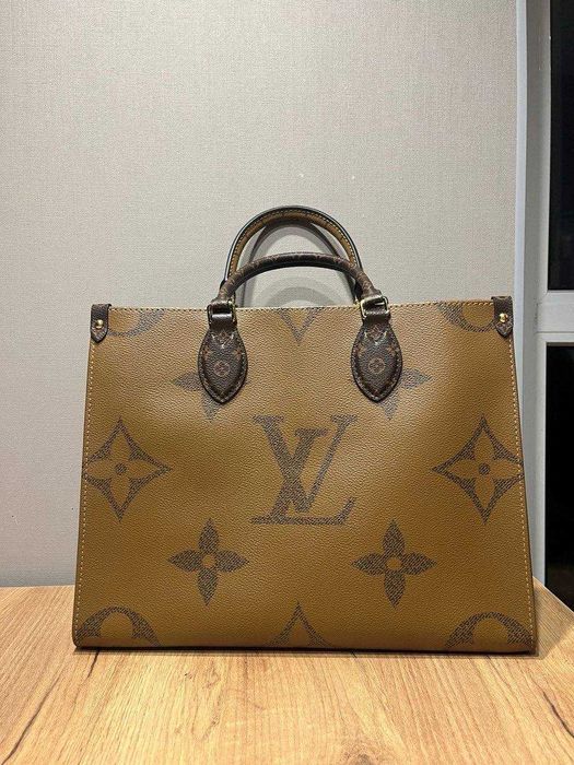 Оригинальная сумочка Луи Витон Louis Vuitton On The Go б/у с чипом