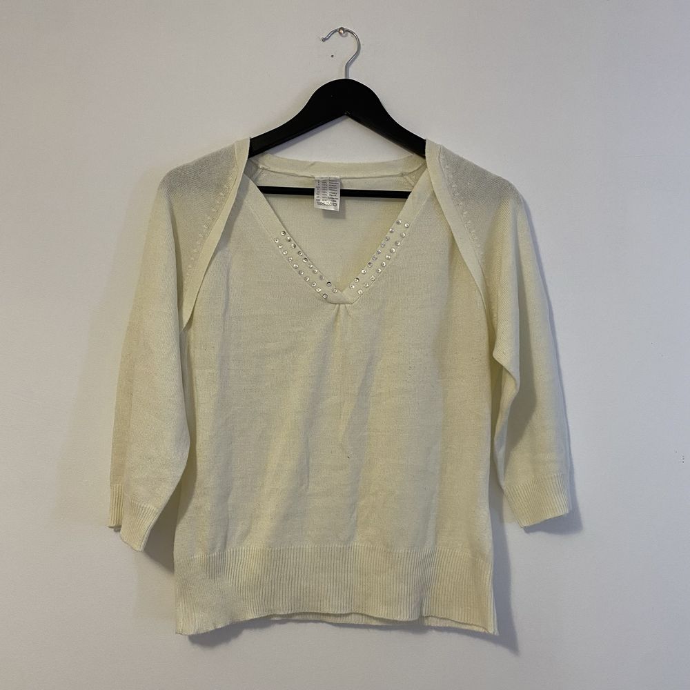 Kremowy sweterek 40 L