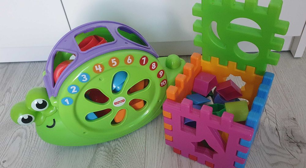 Ślimak Fisher Price i kostka z klockami