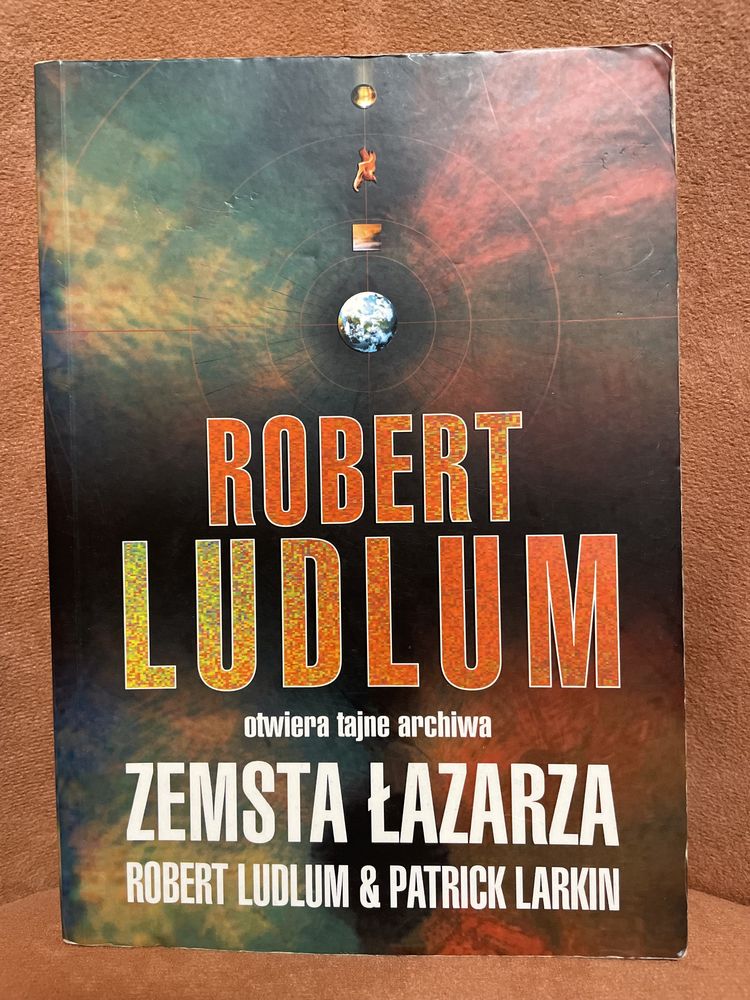Robert Ludlum „Zemsta Łazarza” , polecam .