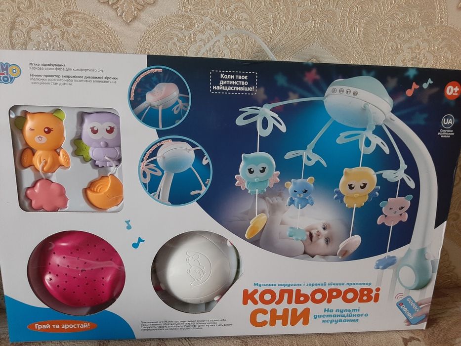 Игрушка в кроватку