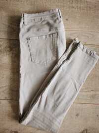 Szare spodnie, jeansy z zamkami Reserved