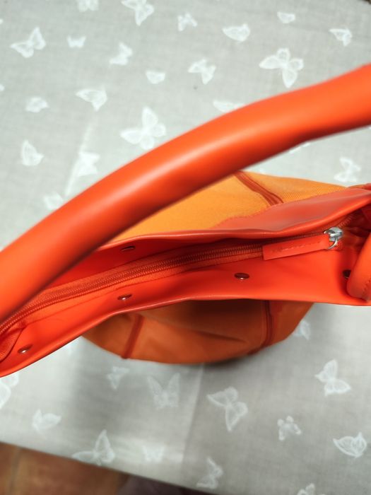 Bolsa cor de laranja de senhora