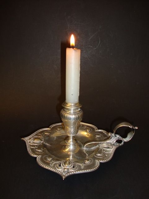 Palmatória antiga em Prata