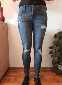 Spodnie jeansowe z dziurami rozdarciami skinny push up jeans Wax 7 S