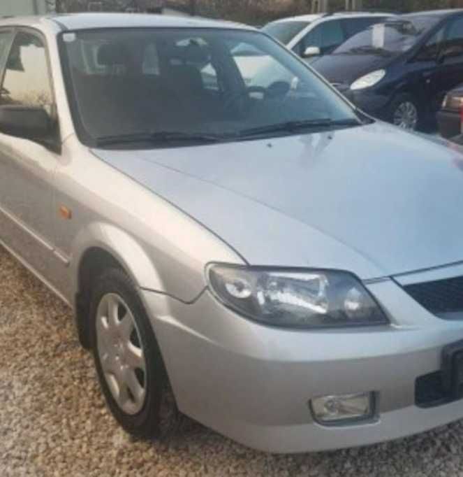 Guarda-lamas frt. drt. Mazda 323F BJ