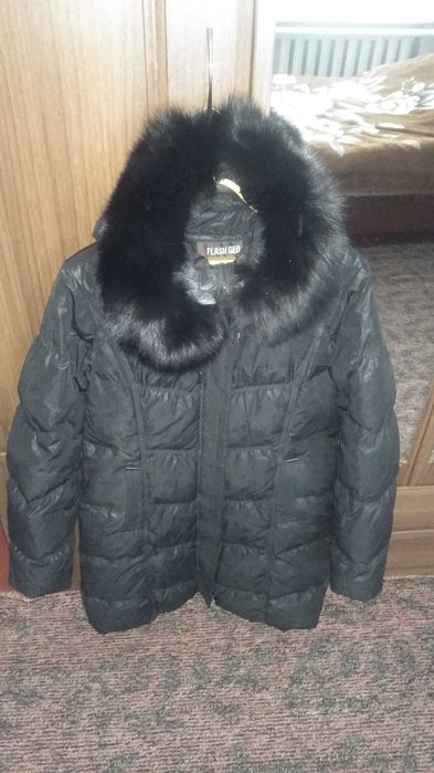 Продам женский пуховик