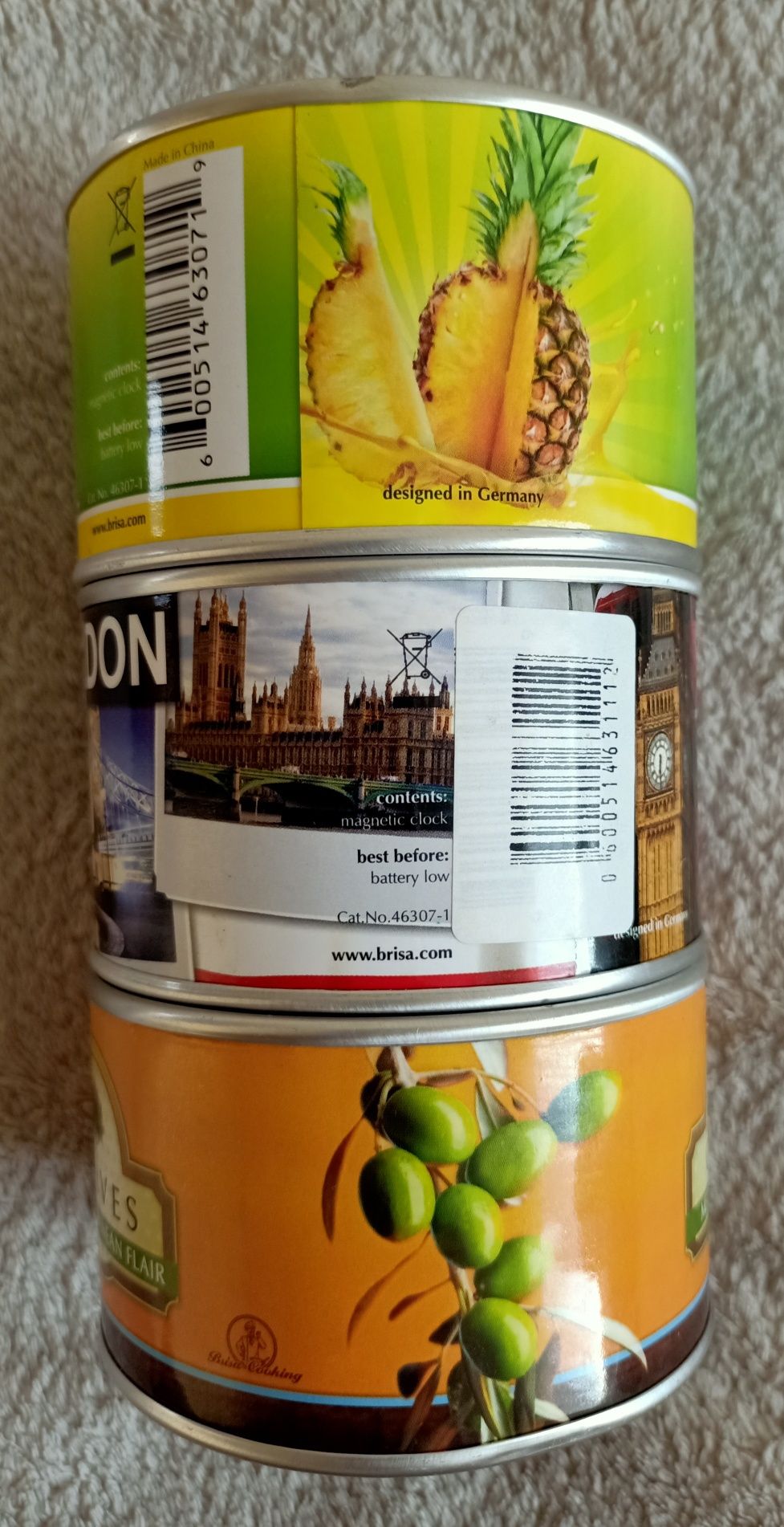 Puszka, konserwa z niespodzianką - zegar Londyn oliwki ananas