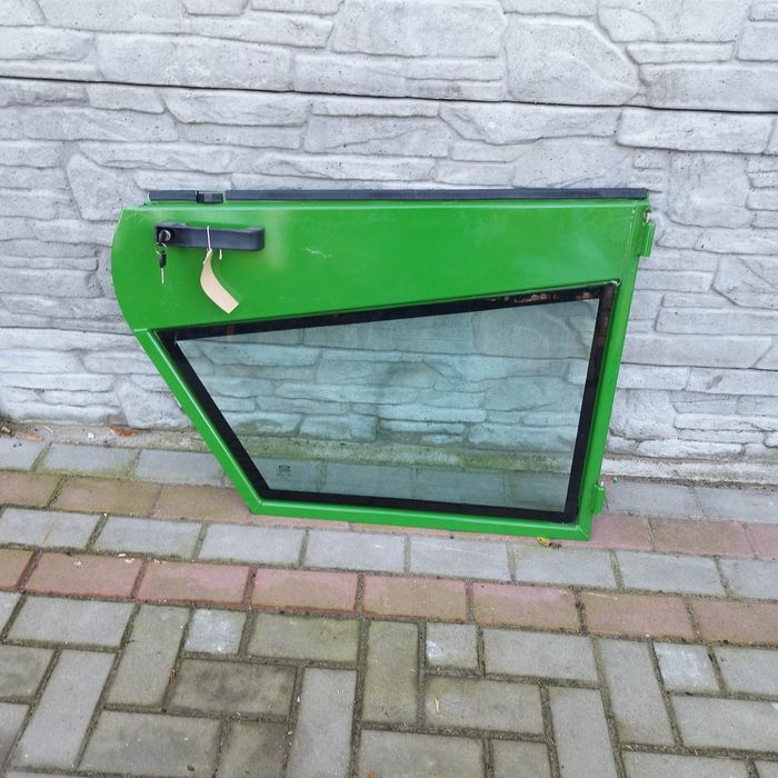 Drzwi dolne Ladowarka John Deere 4400 lub 4500 EQ503560 Nowe