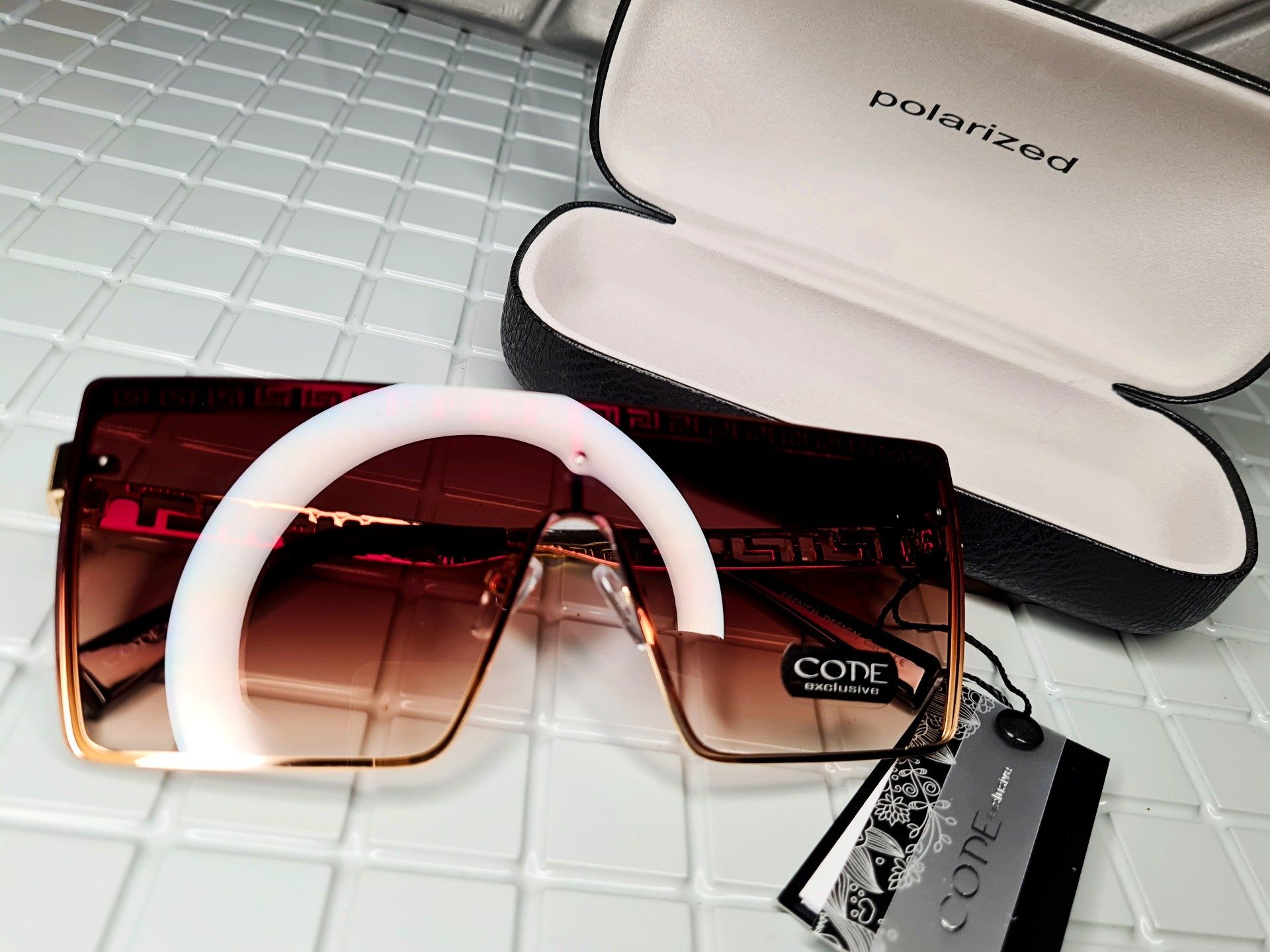 Nowe okulary przeciwsłoneczne damskie marki Code brązowe