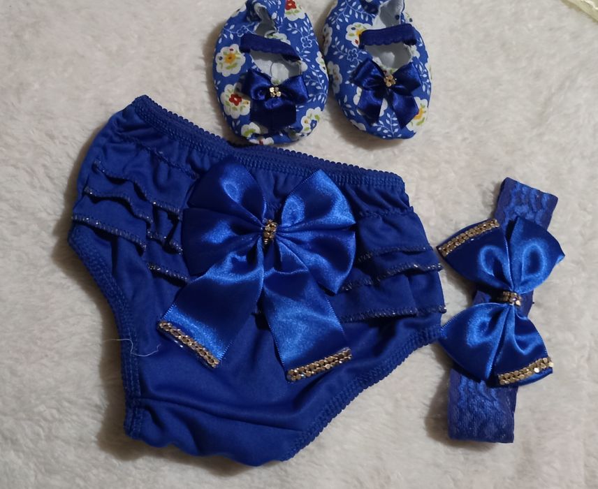 Vendo Tapa fralda + lacinho + sapatinho