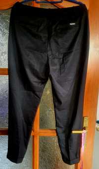 Spodnie marki orsay czarny brokat
