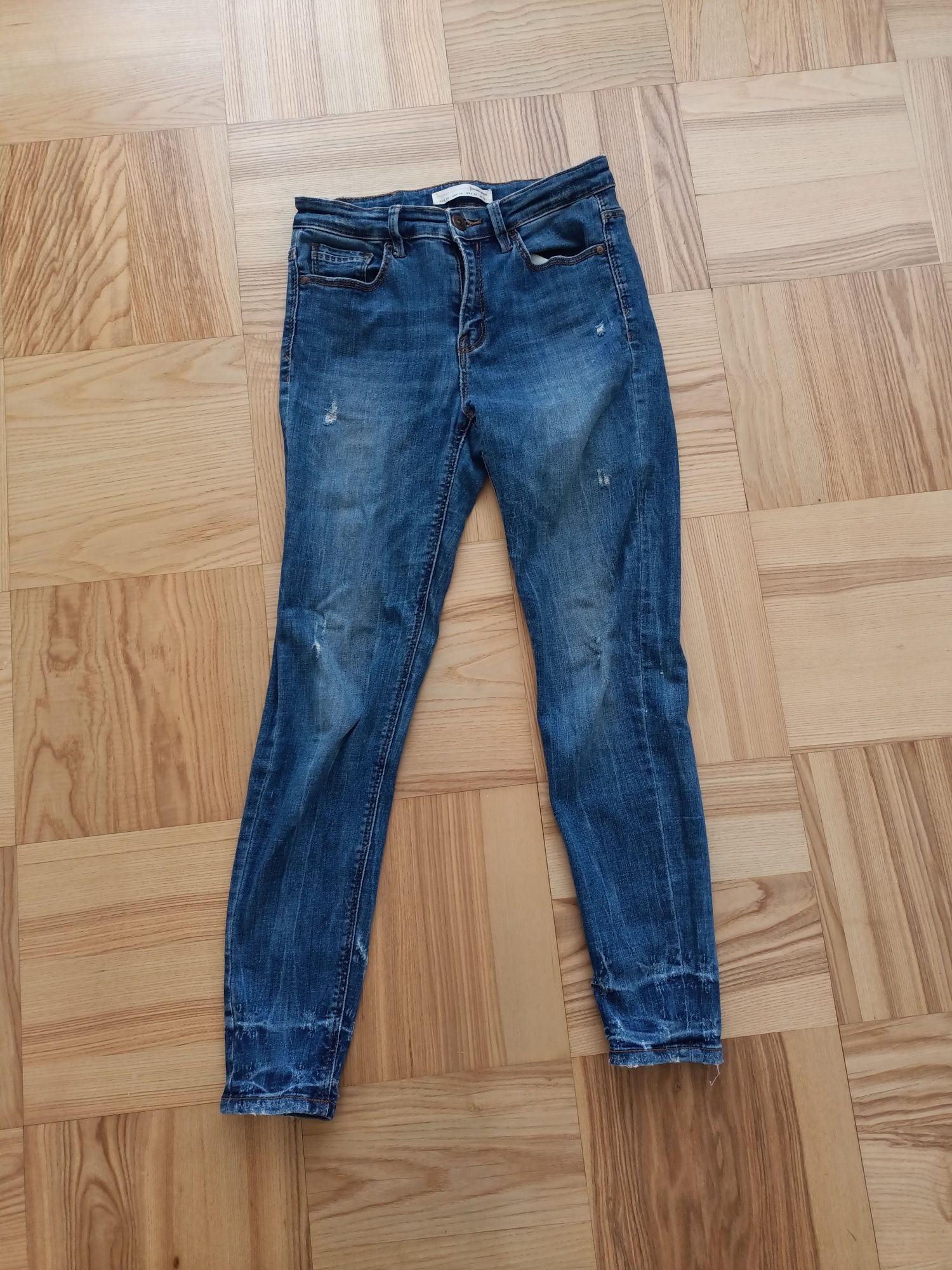 Jeansy Stradivarius dżinsy spodnie skinny z przetarciami rurki obcisłe