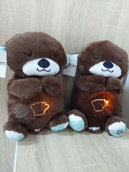 Мішка дихаючий, що світиться і грають мелодії