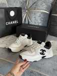 Белые кроссовки Chanel