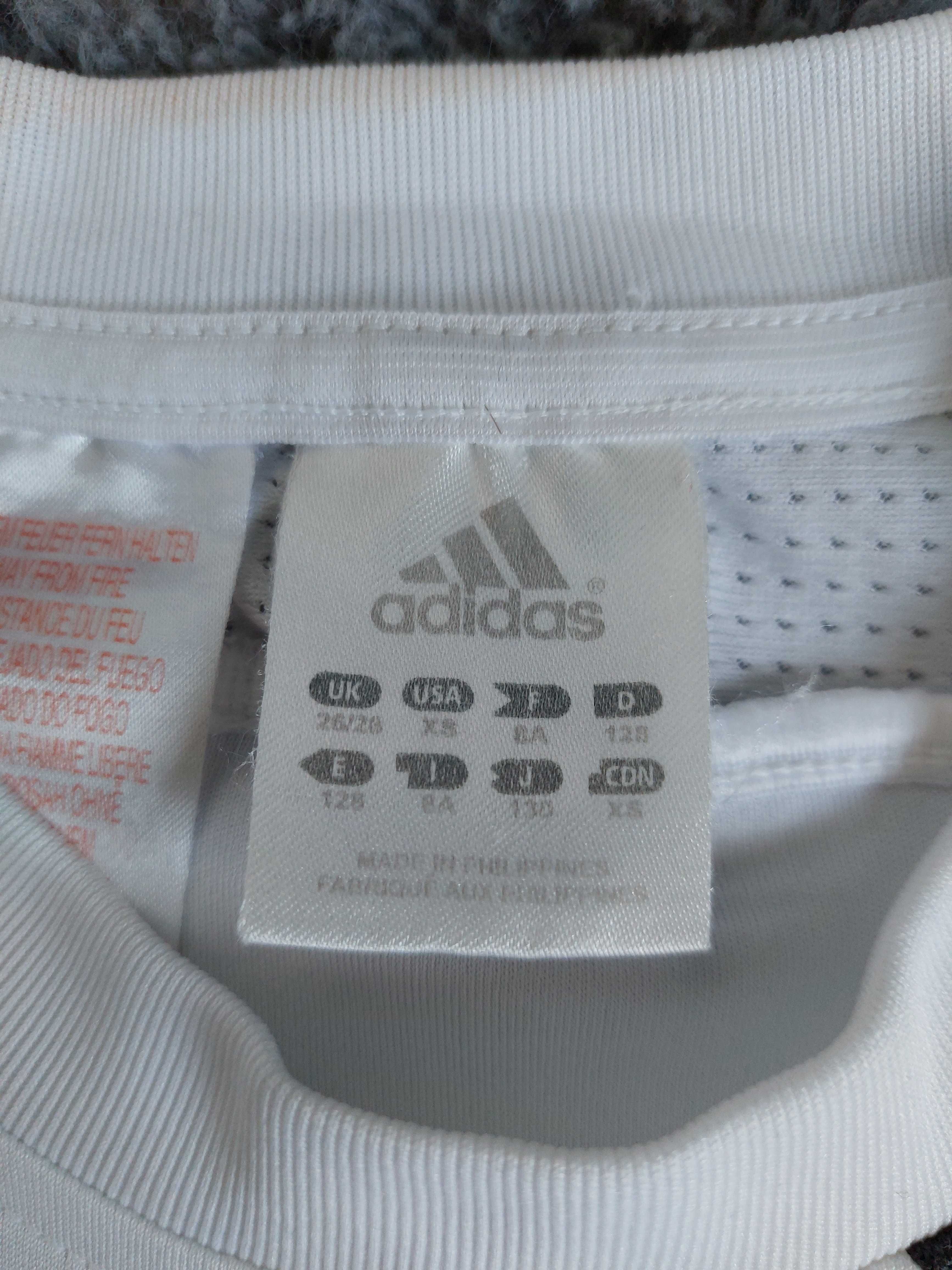 Koszulka funkcyjna bezrękawnik Adidas biała dla chłopca rozm. 128