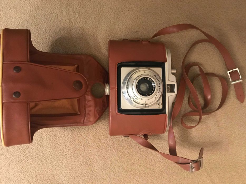 Varias maquinas de fotografar antigas a funcionar