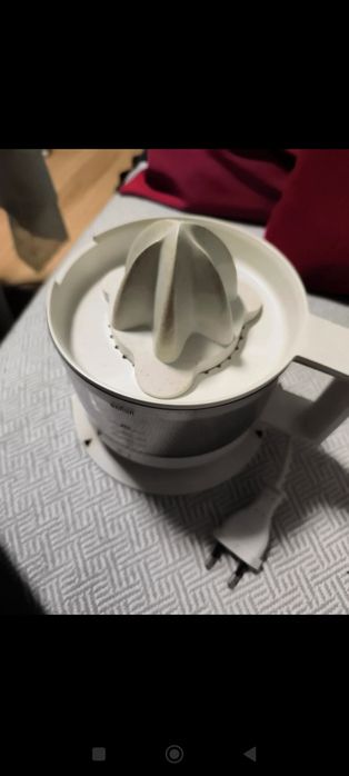 Elektryczna wyciskarka do cytrusów wolnoobrotowa do soków Braun biała