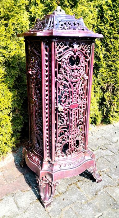 Kominek żeliwny z przełomu XIX i XX wieku - Bretania